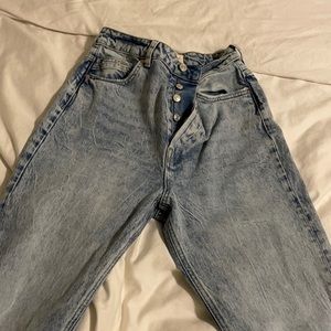 Free people light wash jeans.